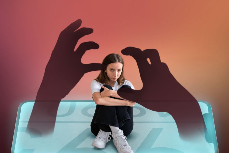 teenager being cyberbullied