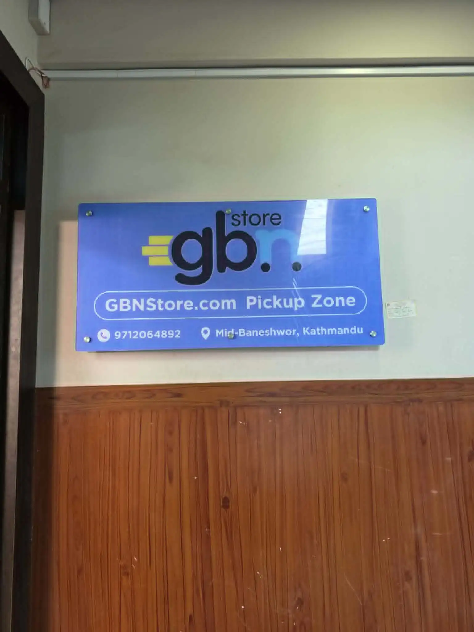 GBN Store Pick Up Zone Banner in Entrance of Store