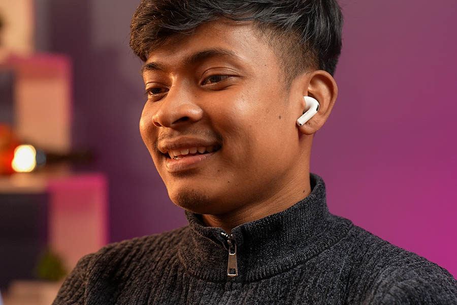 Casually vibing to music on AirPods 5